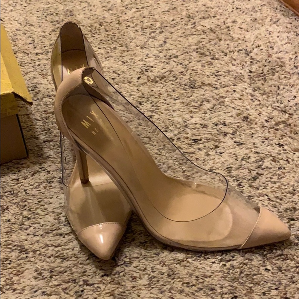 Clear plastic and tan heels